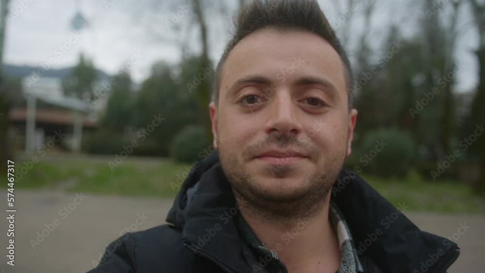 POV Selfie Video Conference of a Handsome, Short-Haired Young Man with Fair Skin Outdoors, Holding Smartphone POV Selfie Video Conference of a Handsome, Short-Haired Young Man with Fair Skin Outdoors, Holding Smartphone