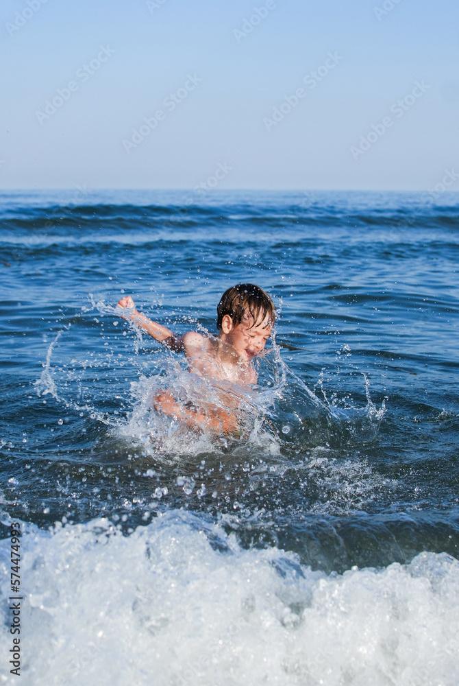 swim, learn to swim, child laughs, waves, splashes, ocean, danger on water