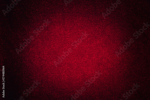 Abstract dark red background with spot lighting for copy space.