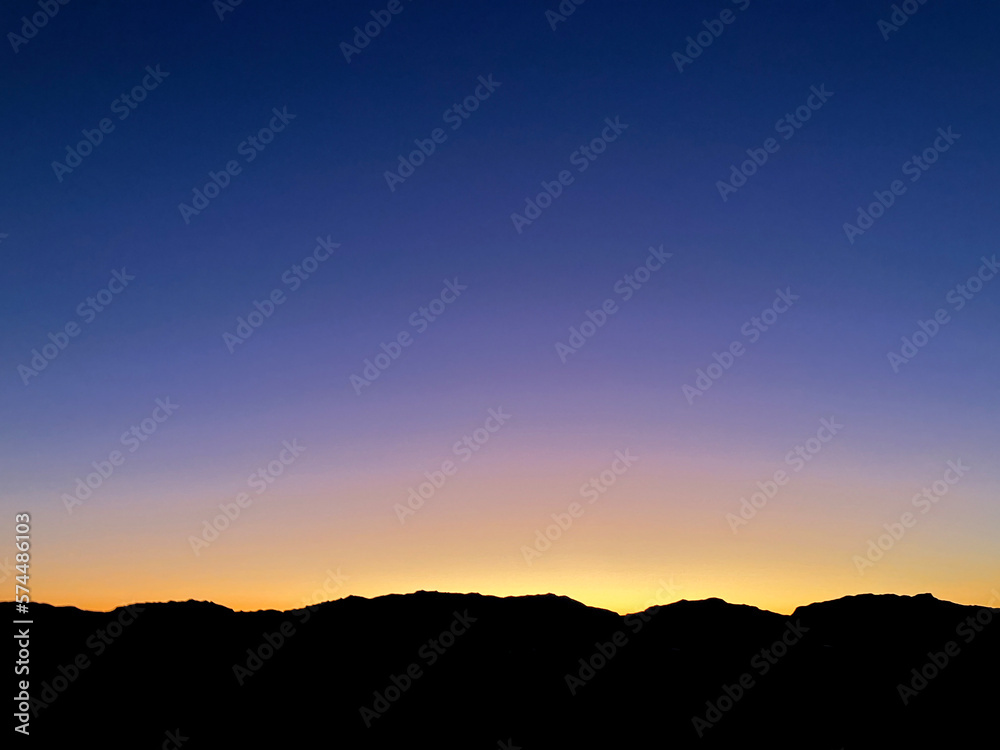 sunset in the desert mountains