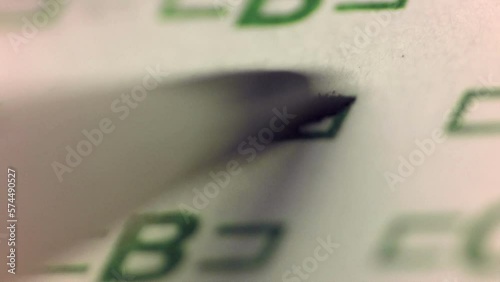 Answer B is filled in on a scantron bubble test sheet with a number 2 lead pencil. The clip included the answer also being erased.