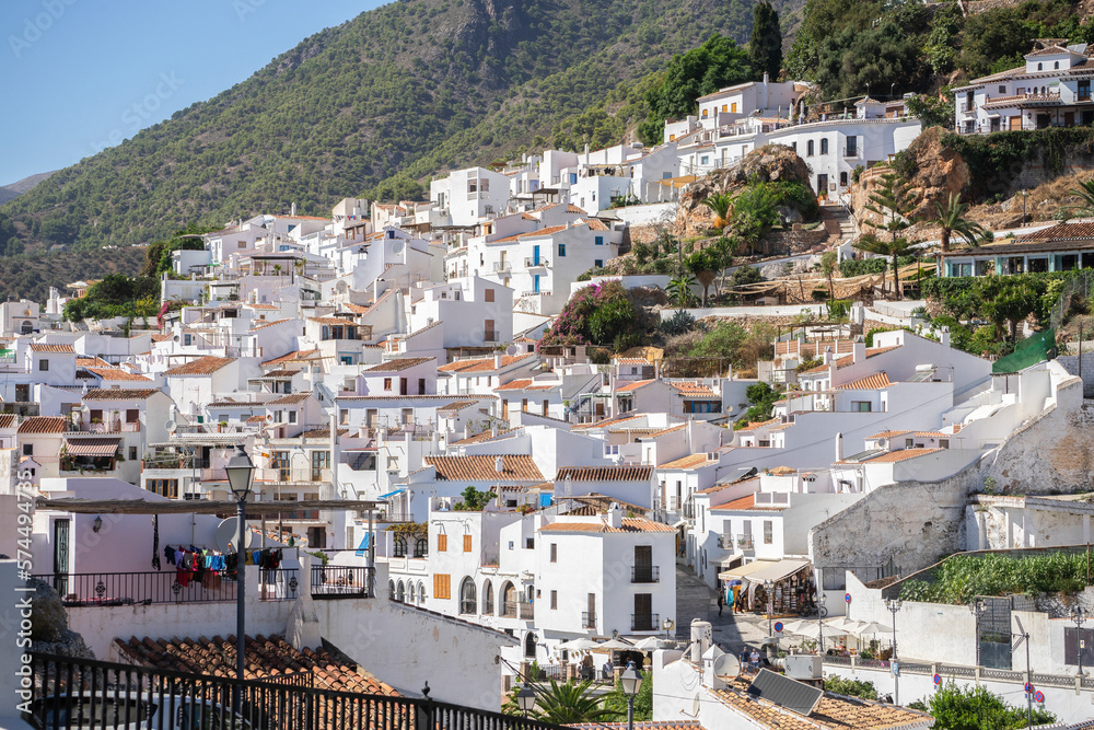 Views of the village of Frigiliana in Malaga with white houses together (Andalusia - Spain).