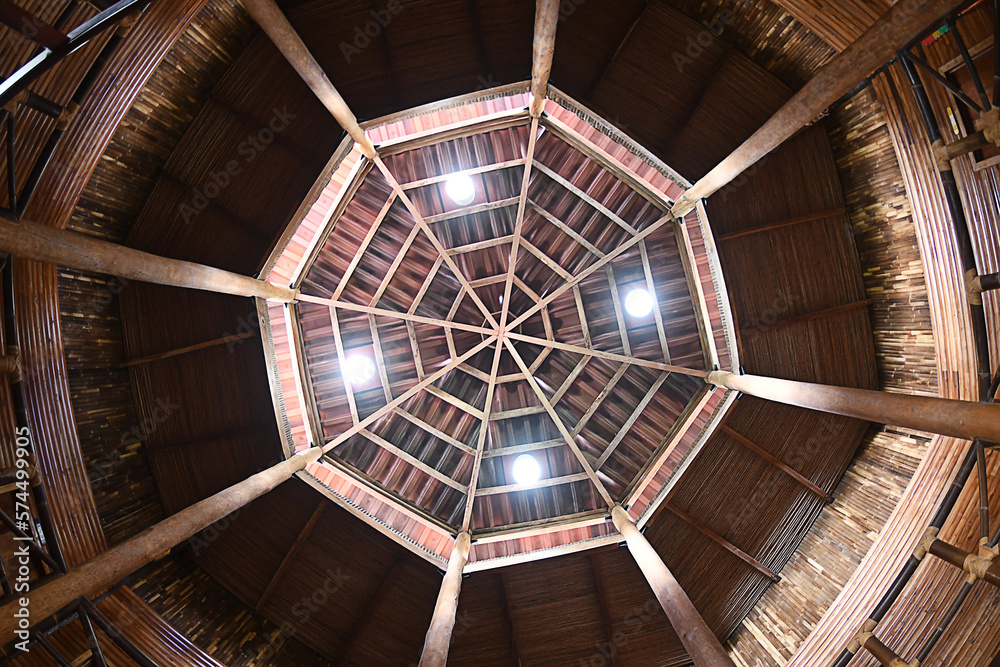 Octogonal ceiling made of wood, with spotlights, viewed from below