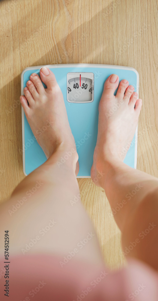 woman measure weight on scale - obrazy, fototapety, plakaty 