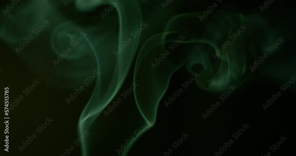 Colorful smoke close-up on a black background Colorful smoke close-up on a black background
