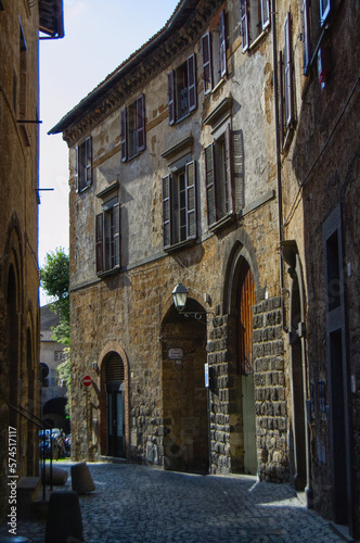 picturesque charming historic old building facade on a narrow lane in Orvieto Italy