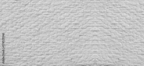 Wide Surface of Vintage white brick wall background.