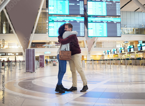 фотографія Couple, hug and goodbye at airport for travel, trip or flight in farewell for long distance relationship