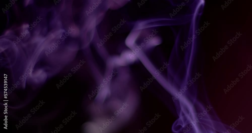 Artificial smoke on black background in darkness Artificial smoke on black background in darkness