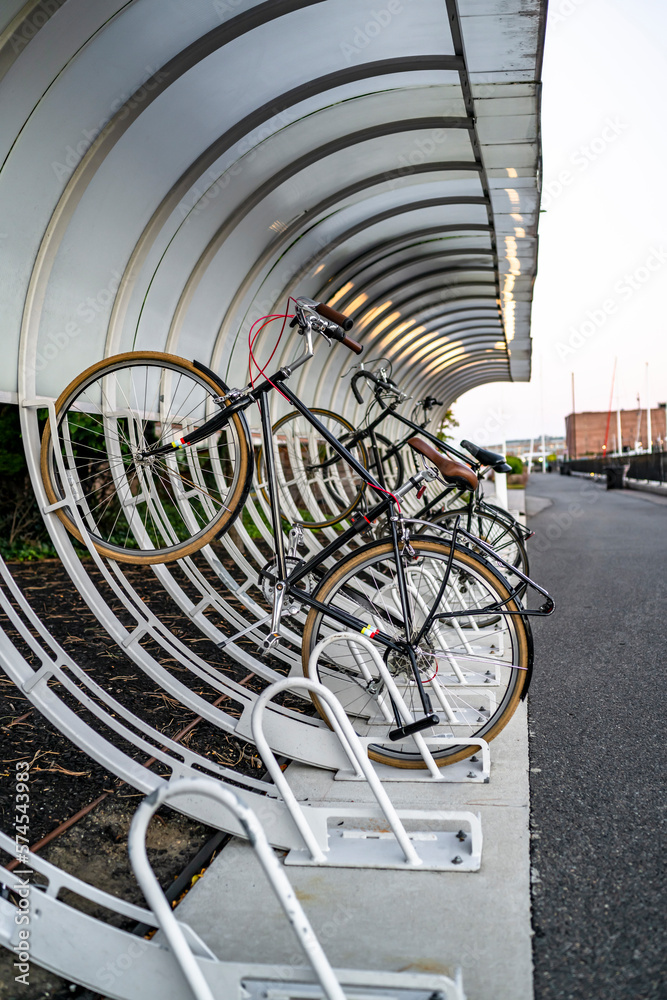 Spherical public bicycle parking for fans of active and ecological way of transportation on the waterfront in Boston Spherical public bicycle parking for fans of active and ecological way of transportation on the waterfront in Boston
