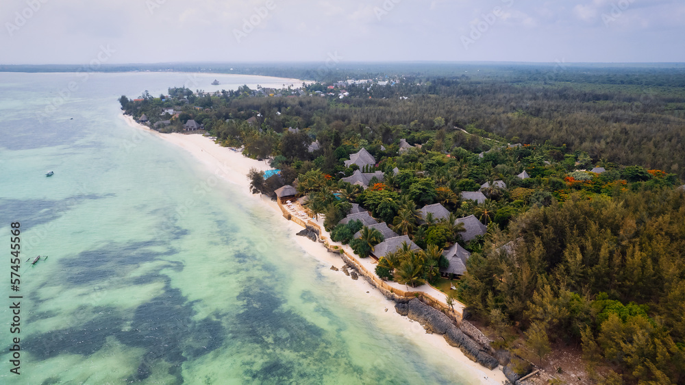 Aerial drone photography captures the breathtaking beauty of Zanzibar's crystal clear waters and white sandy beaches in Nungwi.