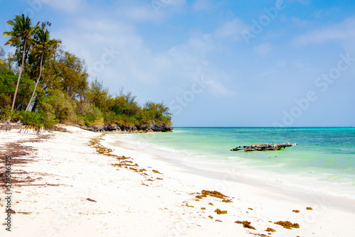 Fototapeta Naklejka Na Ścianę i Meble -  A vacation to Zanzibar's beaches offers the perfect blend of adventure and relaxation, with opportunities for travel, tourism, and exploration of the island's natural wonders.