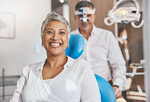 Portrait, happy and dental with a woman patient in a doctor office for oral hygiene or health. Smile, teeth and healthcare with a senior female sitting in a chair at the dentist for hygiene