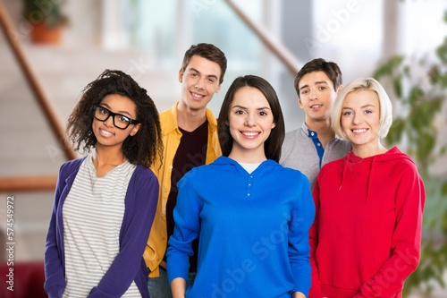 Happy group of young university students.