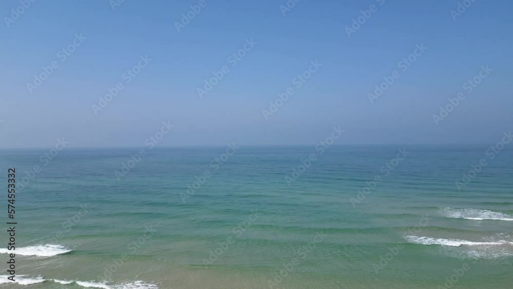 4K Isolated top aerial view of a vacant beach with a few - Bat Yam Israel 4K Isolated top aerial view of a vacant beach with a few - Bat Yam Israel