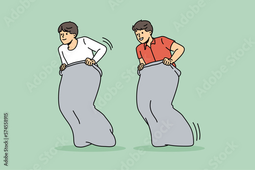 Smiling boys sit in bags jumping during funny activity together. Happy male players racing in sacks. Game and leisure. Vector illustration. 