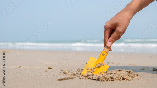 child playing on the beach