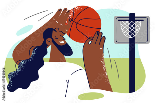 African American man with basketball in hands enjoy hobby of practicing to shoot at net