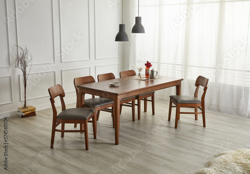 Wood dining table landscape with sunlight.