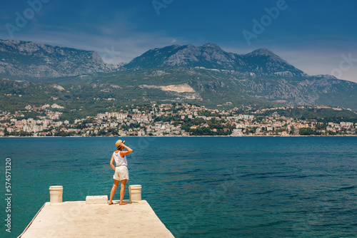 Tourist woman looking at Herceg Novi © Anna Lurye