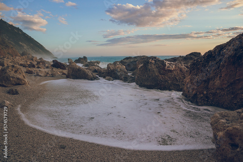 Waves hitting the rocks at Megali Petra Beach, Lefkada, Greece photo