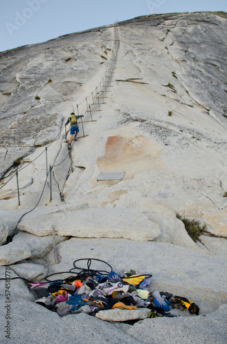 A pile of gloves left over from summer hikers lay at the start of the Half Dome cables in Yosemite, California.