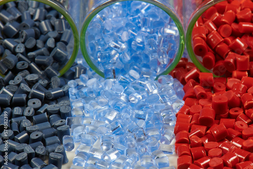 Colored plastic resins in test tubes in laboratory photo