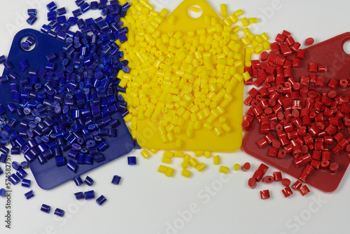 Colored plastic resins in test tubes in laboratory photo