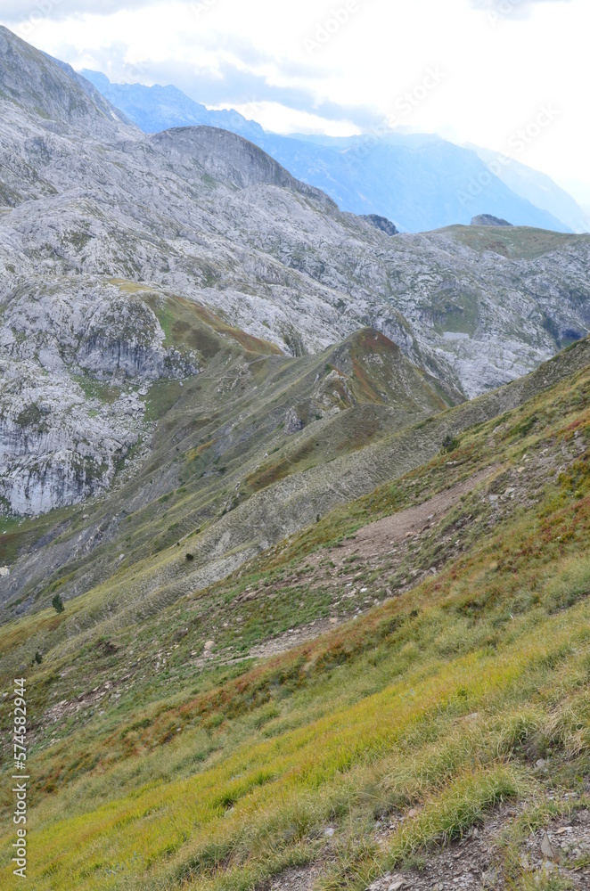 Fototapeta premium The mountains of the Prokletije National Park in the autumn near the Grebaje Valley of Montenegro. The Accursed Mountains. Albanian Alps.