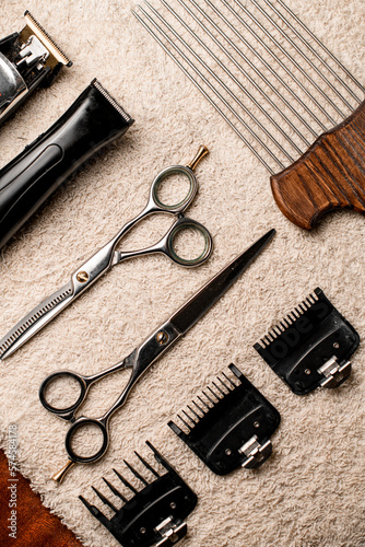 beautiful top view on different equipment for hairdressing service on table. Barbershop.