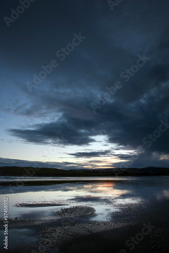 Sunset at Surat bay river mouth. Cattlins New Zealand. South Island. Twilight. 