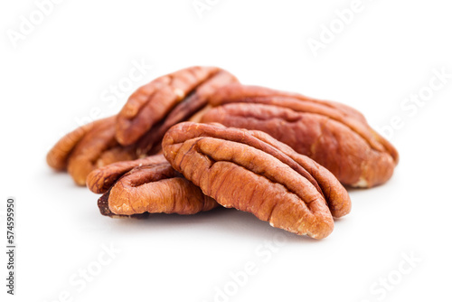 Peeled pecan nuts isolated on white background.