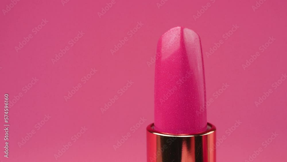 Lipstick on a pink background. Lipstick on a pink background.