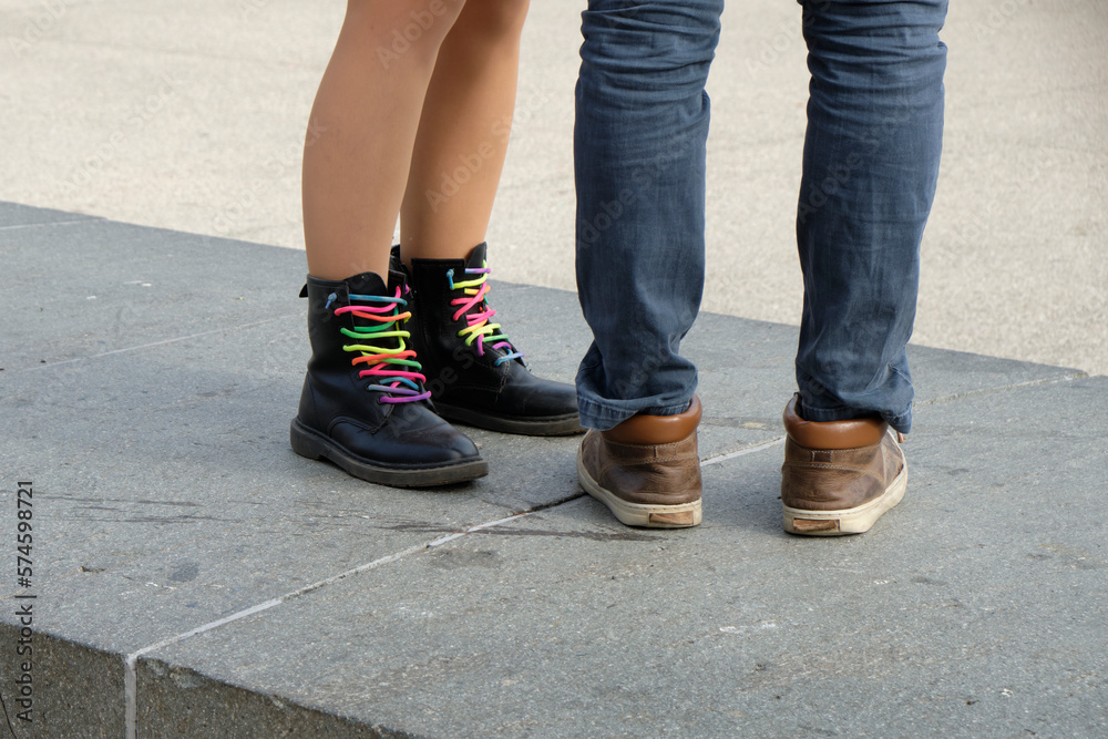 black boots with colored laces. black boots with colored laces.