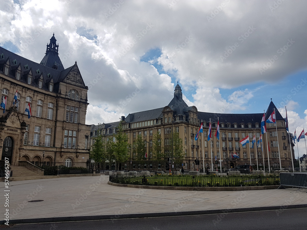 Beautiful old buildings, square and flags in Luxembourg City