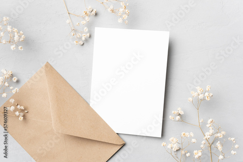 Blank wedding invitation or greeting card mockup with envelope