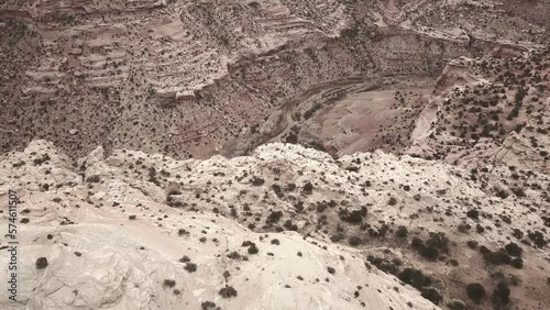 Arid topography of Little Grand Canyon Utah aerial tilt