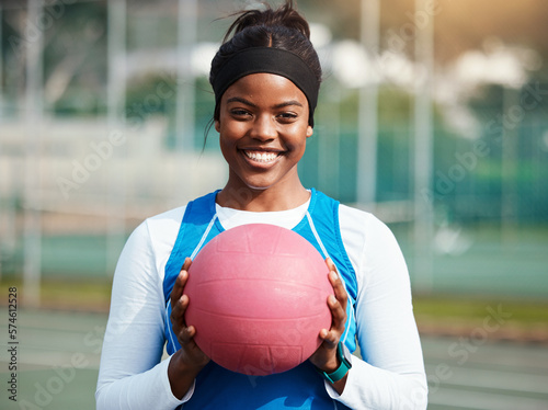 Fototapeta Naklejka Na Ścianę i Meble -  Portrait, black girl with netball and sports with smile, fitness and training for game outdoor, happy teen and ready. Exercise, athlete and African female with ball, healthy and active lifestyle