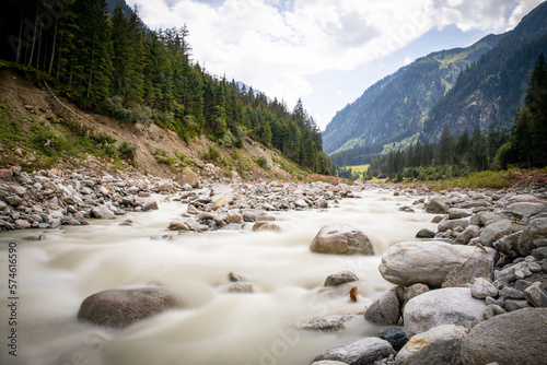 closeup of river in mountain valley in alps pictures border river no people only nature