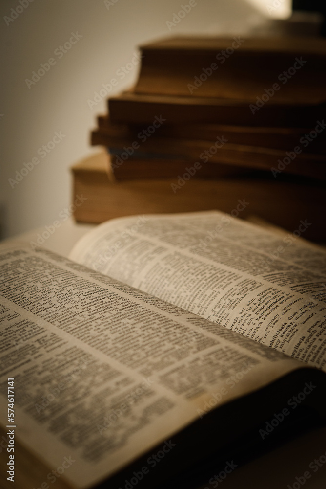 Fototapeta premium Open old, used books, with pages with text, copy speace. 