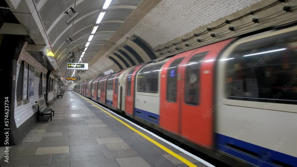 Never ending tube train loop.
Endless London underground train going past a platform. Loops.
