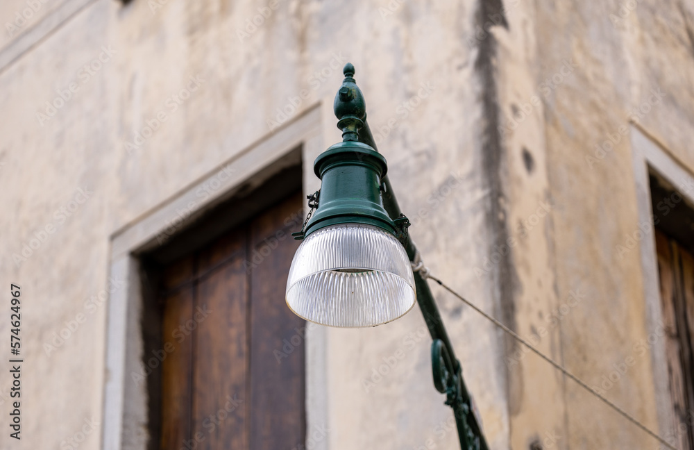 Old wall street lighting, in the old town, Venice, Italy Old wall street lighting, in the old town, Venice, Italy