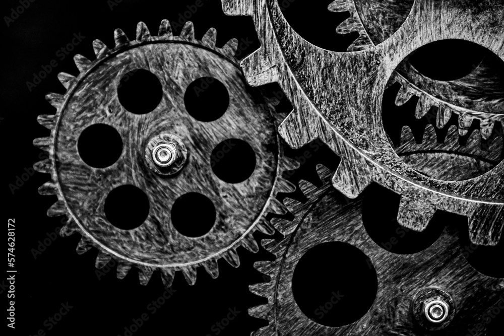 Macro sur des roues à dent métalliques - Engrenage d'horloge ancienne