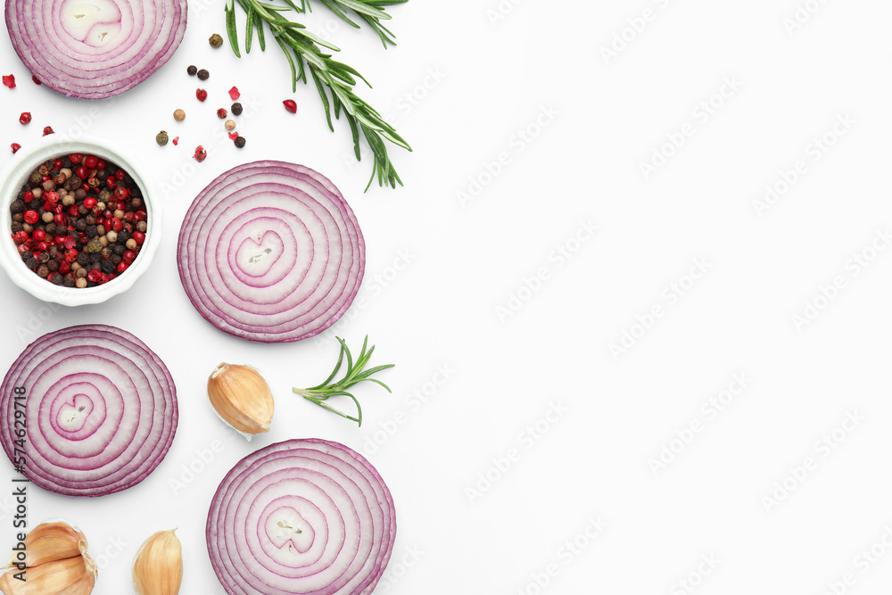 Fresh red onions, garlic, rosemary and spices on white background, flat lay. Space for text