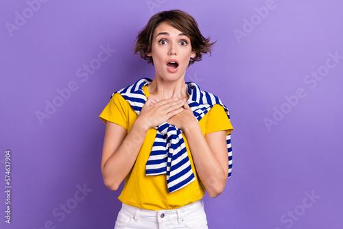 Photo of worried nervous lady stylish clothes arm breast cant believe imagine bad news information isolated on purple color background
