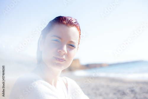 The portrait of woman walking in the beache in sprin weather