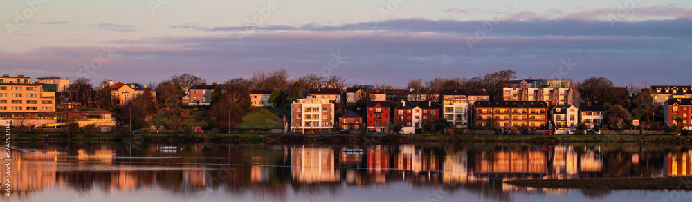 Fototapeta premium Houses on a street in Galway, Ireland are reflected on the surface