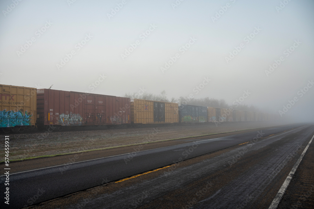 freight cargo train railroad track side of road freight cargo train railroad track side of road