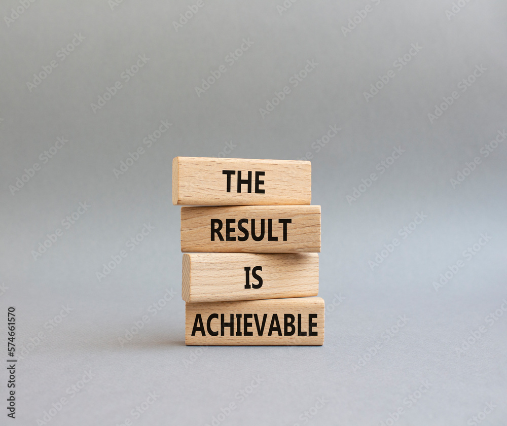 The result is achievable symbol. Concept words The result is achievable on wooden blocks. Beautiful grey background. Business and The result is achievable concept. Copy space. The result is achievable symbol. Concept words The result is achievable on wooden blocks. Beautiful grey background. Business and The result is achievable concept. Copy space.
