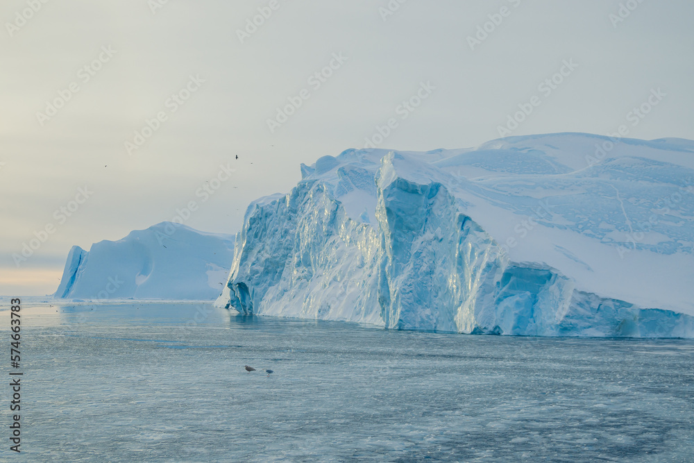 Ilulissat Icefjord, in Greenland, Denmark, Scandinavia is one of the largest glaciers in the world. With its beauty and icebergs, it is a World Heritage Site.